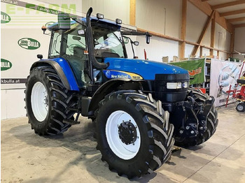 Трактор New Holland tm 150: фото 4